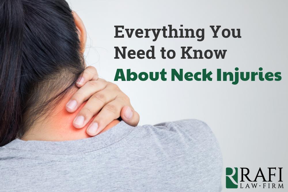 woman holding the back of her neck, she's in pain