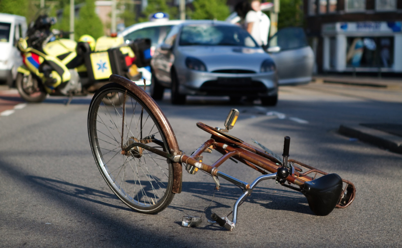 bicycle hit by car