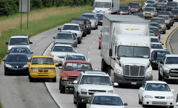 heavy traffic with cars and trucks