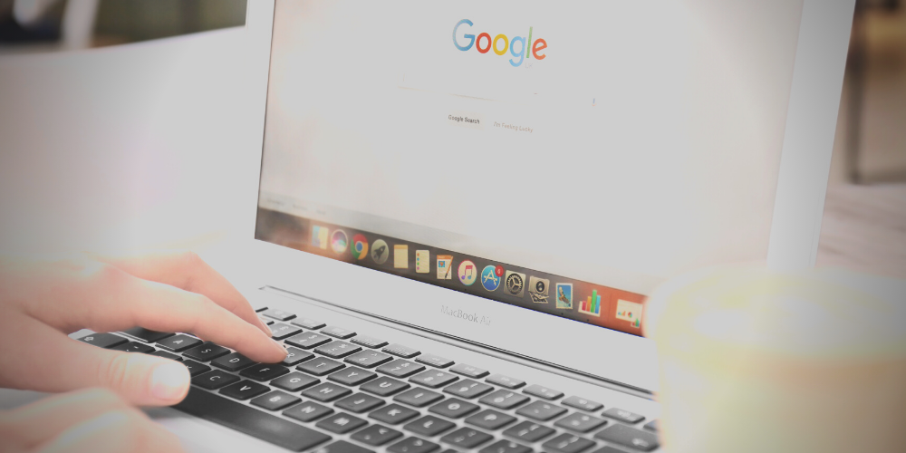 Someone on their laptop googling something